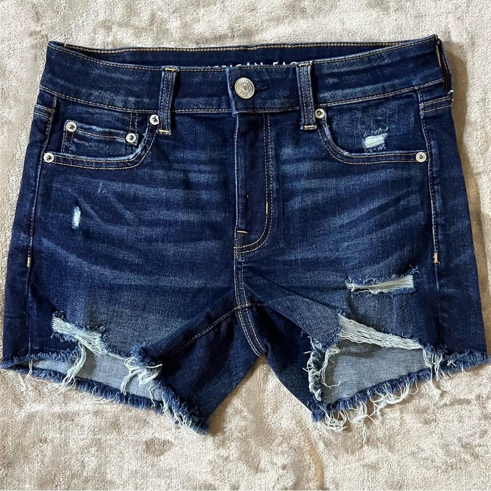 AMERICAN EAGLE DISTRESSED MIDI SHORTS
